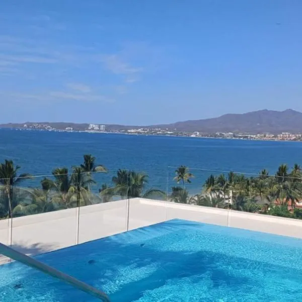 Amazing 2 bedroom condo in Golden Zone steps away from the ocean，位于布塞里亚斯的酒店