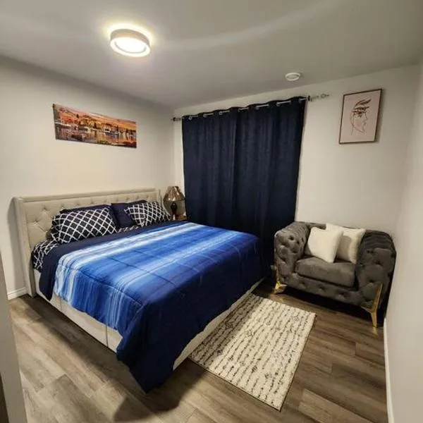 Cozy one bedroom in Airdrie，位于克罗斯菲尔德的酒店