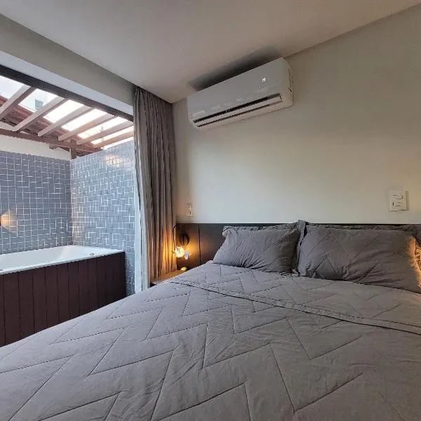 Flat com Jacuzzi Área Externa a 50m praia do Bessa，位于若昂佩索阿的酒店