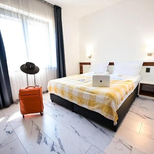 RUBO Hotel，位于舒门的酒店