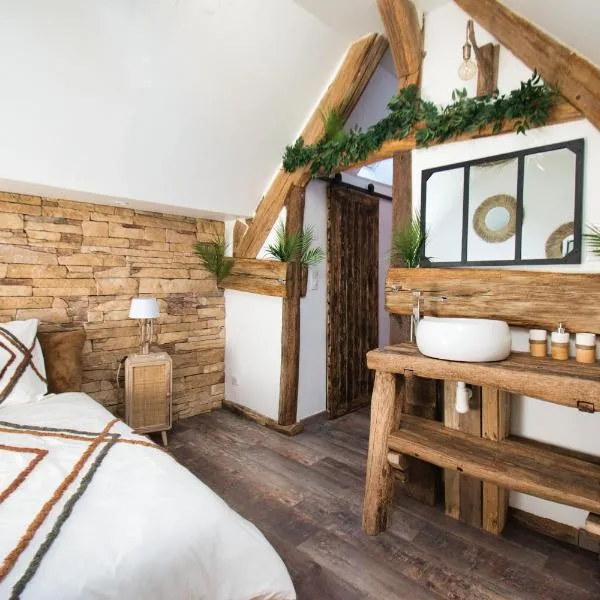 LE RELAIS DES CALECHES - La Jungle Room，位于Broué的酒店