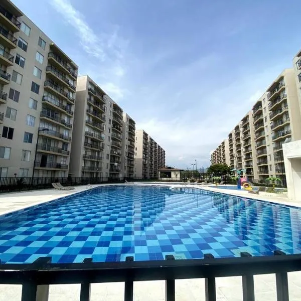 Apartamento Ricurte Piscina Condominio，位于里考尔特的酒店