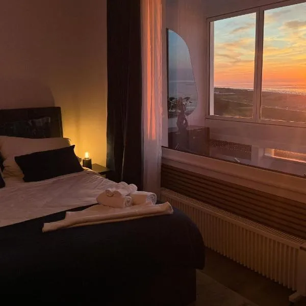 CuxHeaven - modernes Studio-Apartment direkt am Meer mit Pool, Sauna und Massage，位于库克斯港的酒店