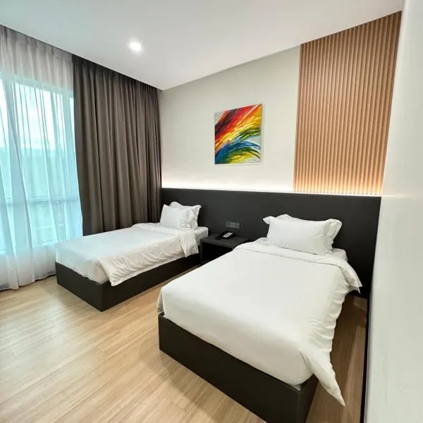 Wendu Inn Hotel，位于古打毛律的酒店