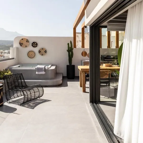 The sand City apartment with Outdoor Hot Tub，位于阿基欧斯尼古拉斯的酒店