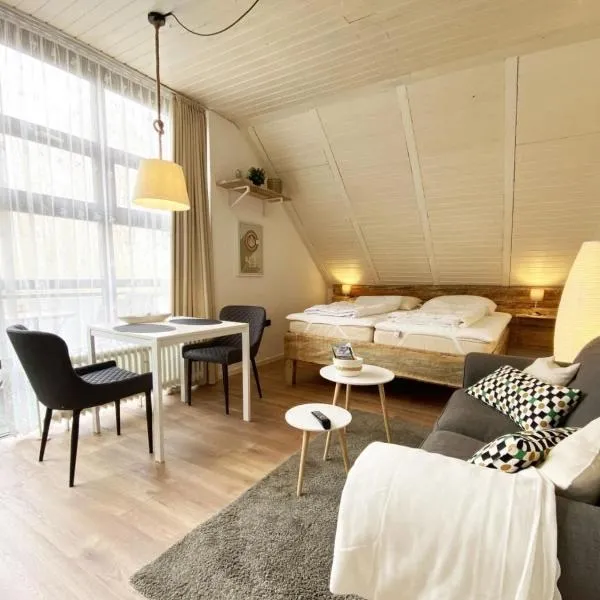 Ferien im Wangerland - Haus Wiesenweg - Apartment 1 1OG，位于霍鲁梅尔希尔的酒店