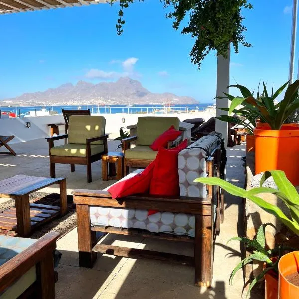 Casa de Poço Guest House and Gallery，位于明德卢的酒店