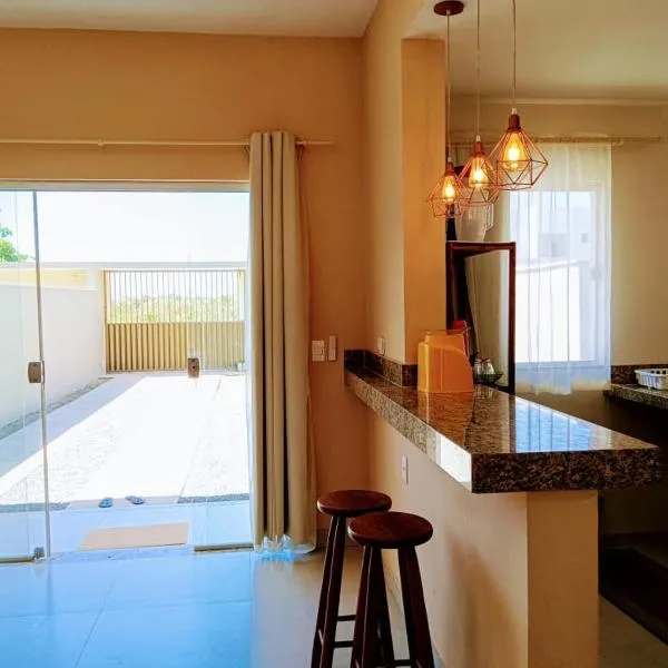 Casa Tartaruga 3 - Estilo a 50m da Praia de Guriri，位于古里里的酒店