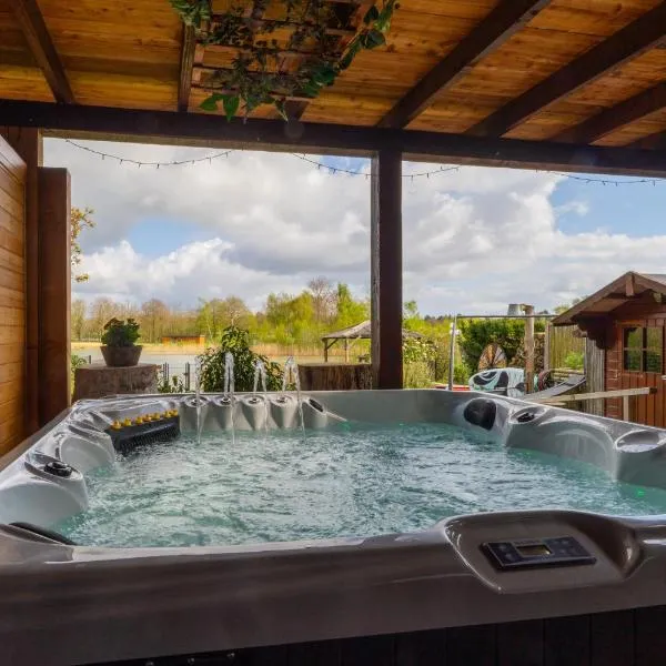 Drents Genieten - Lavendelheide met uitzicht op het water，位于Erm的酒店