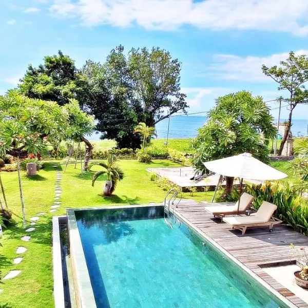 JOGLO APONG Beachfront Apartment，位于Tegallengah的酒店