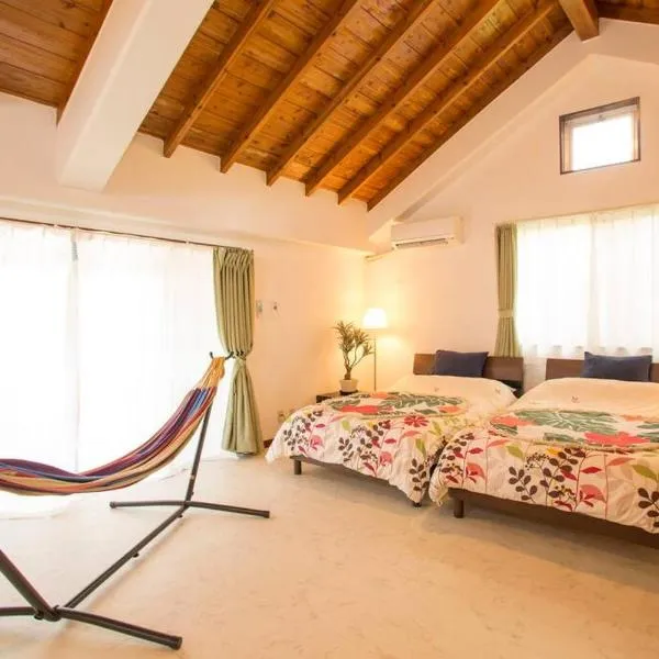 沖縄といえばココ！！美ら海水族館徒歩圏内！ビーチにBBQに星空観察　隠れ家的貸切一軒家，位于国头村的酒店