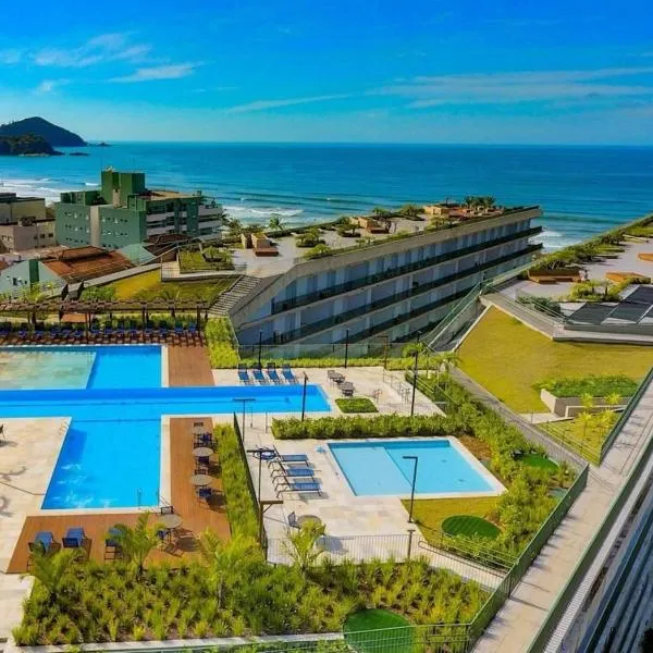 Resort frente ao mar apto 1222 DNA Praia Grande，位于乌巴图巴的酒店