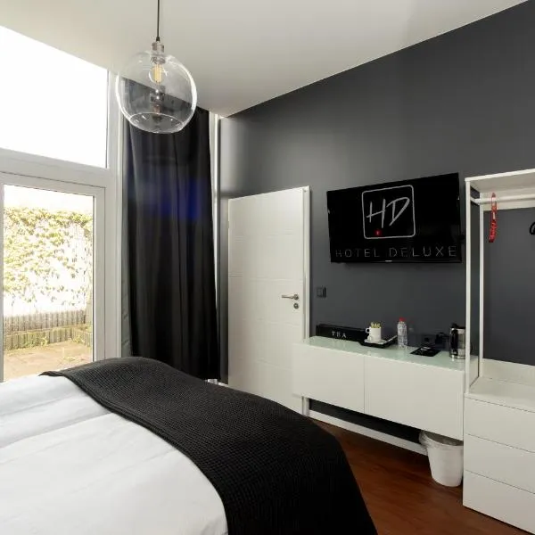 Hotel Deluxe，位于多斯滕的酒店