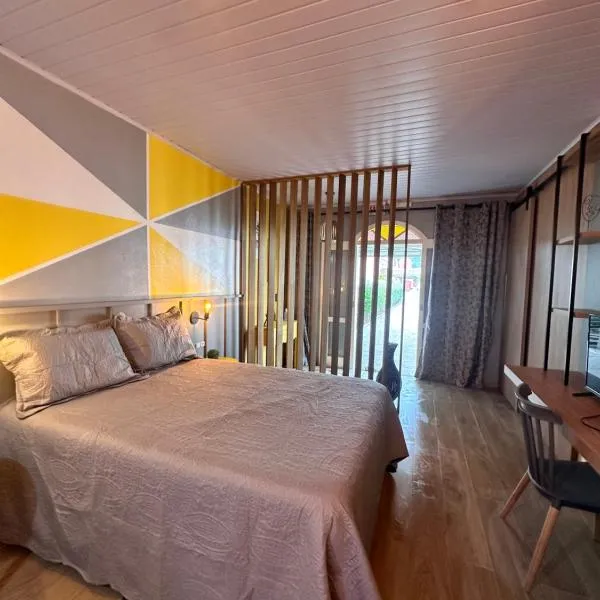 La vita hospedaria (quarto amarelo)，位于Nova Veneza的酒店
