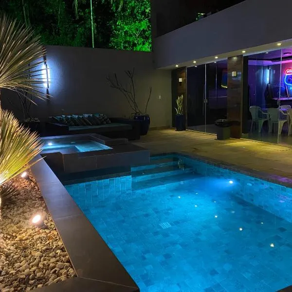 Casa com Piscina no bairro João VI, Muriaé-MG，位于穆里亚埃的酒店