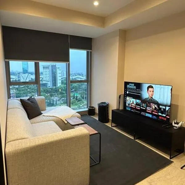 1BR Branz BSD: PS5, King Size Bed, and 4K OLED TV，位于当格浪的酒店