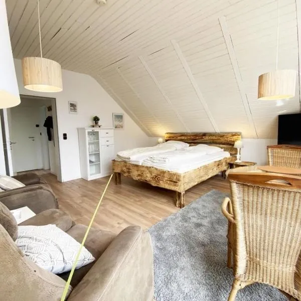 Ferien im Wangerland - Haus Wiesenweg - Apartment 3 1OG，位于霍鲁梅尔希尔的酒店