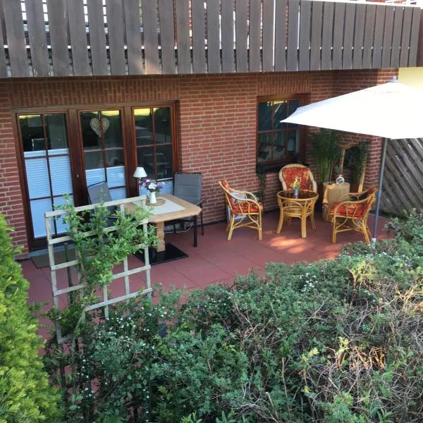 Landhaus am See mit Strandkorb in Scharbeutz，位于沙博伊茨的酒店