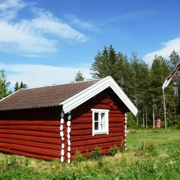 Hytte fra 1721 uten internett, strøm, vann - men med rødmalt utedo，位于Ljørdal的酒店