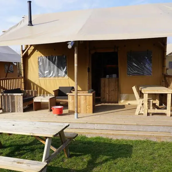 Glamping met bar en privé sanitair voor 5 Personen Sneezy，位于Behelp的酒店