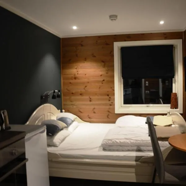 Fossheim Lodge - arealeffektiv minileilighet，位于Torset的酒店