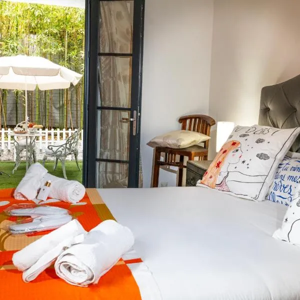 Les Canoubiers Luxe et sérénité au cœur de Saint-Tropez Suites spacieuses avec jardin enchanteur，位于格里莫的酒店