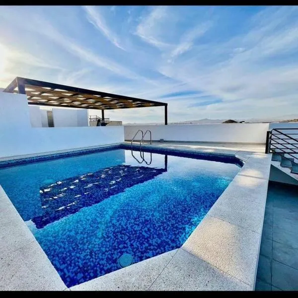 Oceanview Condo / Rooftop pool，位于卡波圣卢卡斯的酒店
