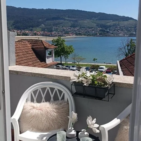 Rincón del Mar Terrazas y vistas a la Ría de Vigo，位于莫阿尼亚的酒店