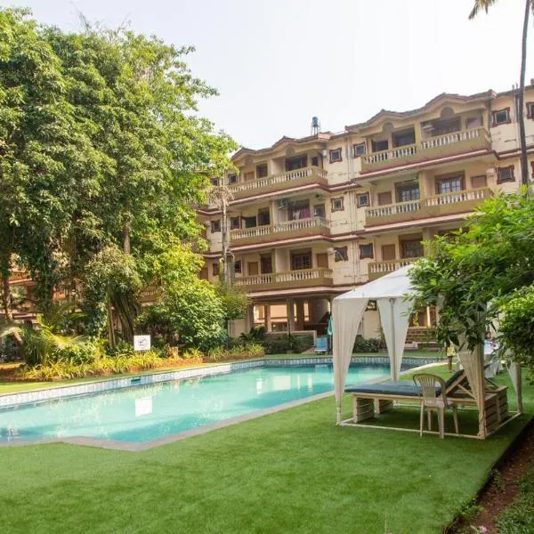 Comfortable 1BHK Resort Aptmt with Pool at Candolim for 4 ppl，位于坎多林的酒店