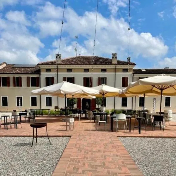 OSTERIA DI CIMBRIOLO E DORMIRE AL CIMBRIOLO，位于San Martino dallʼ Argine的酒店