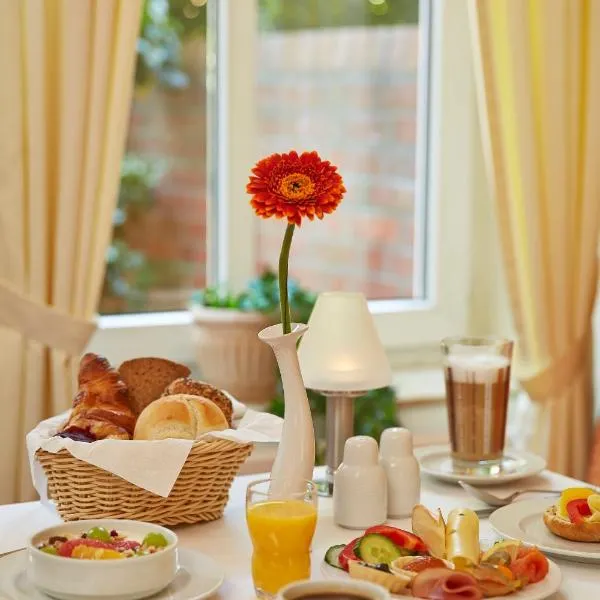 施塔德赫尔佐格维杜金德H+酒店，位于施塔德的酒店