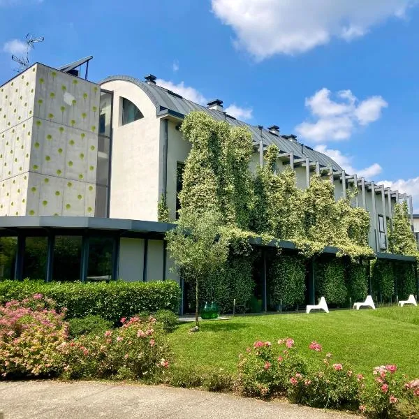艾克斯皮客房酒店，位于卡尔达诺阿尔坎波的酒店