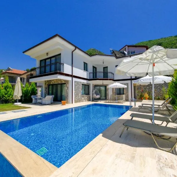 Mediterranean Breeze Villa - Family-Friendly Luxury Villa - Fethiye by Sunworld Villas，位于费特希耶的酒店