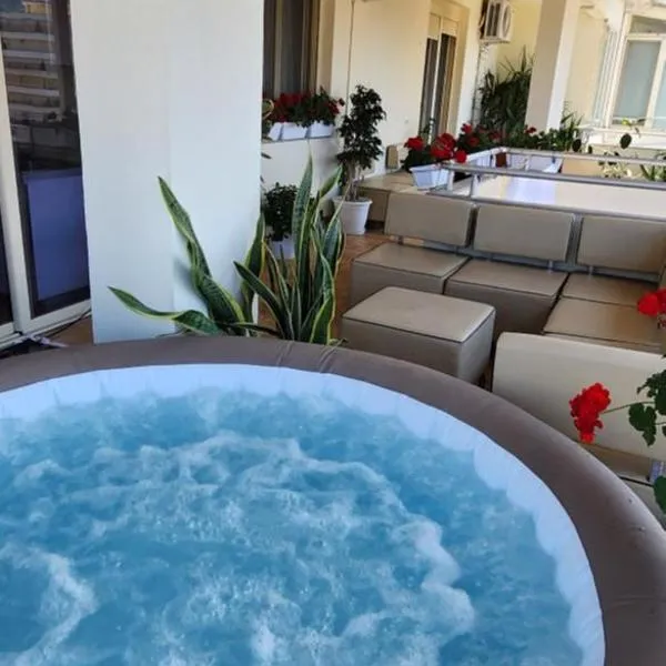 Hana apartament hot tub，位于伏罗拉的酒店