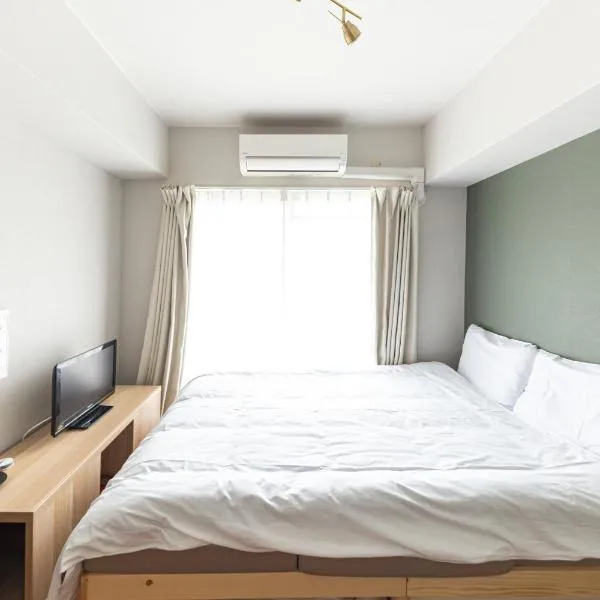 702 道頓堀側のお部屋 中心地へのアクセス抜群 ダブルベッド1台,位于大阪的酒店