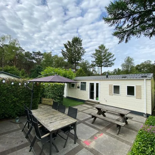 Veluwe, gezellig 4p chalet bij bos, zonnige tuin，位于奥特罗的酒店