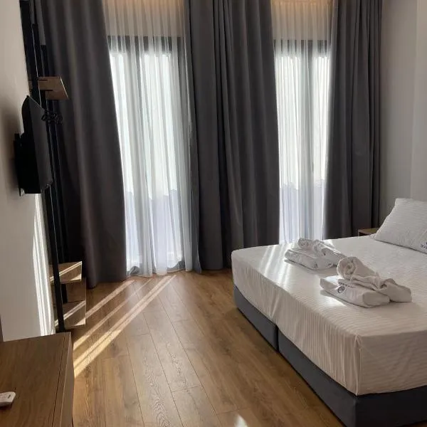 Dia Mare Deluxe Rooms，位于伏罗拉的酒店