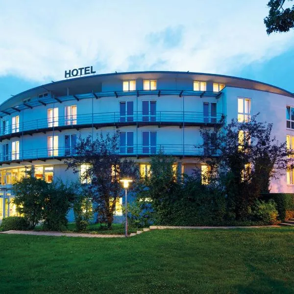卡普兹奈霍夫酒店，位于里斯河畔比伯拉赫的酒店