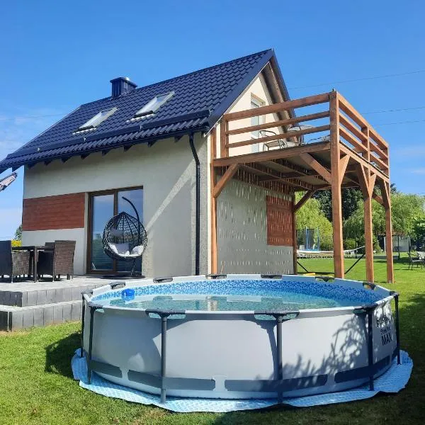 Przy jeziorze - domek na Kaszubach，位于Rokity的酒店