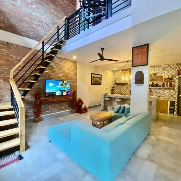 Modern 2-bedroom townhouse with rooftop terrace，位于贡布的酒店