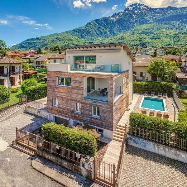 Villa Family with pool and amazing panoramic penthouse，位于科利科的酒店