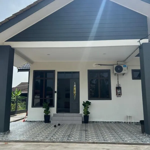 Homestay Tokmi 1，位于Kampong Bukit Parit的酒店