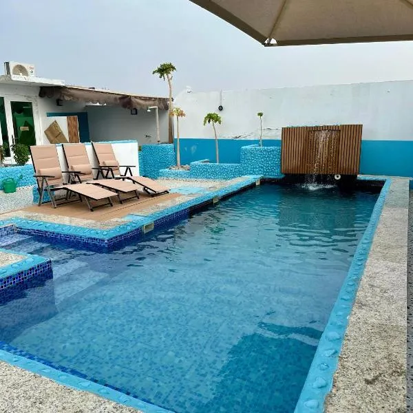 Private Rooms in Shared Beach Chalet - 1，位于阿尔哈德的酒店
