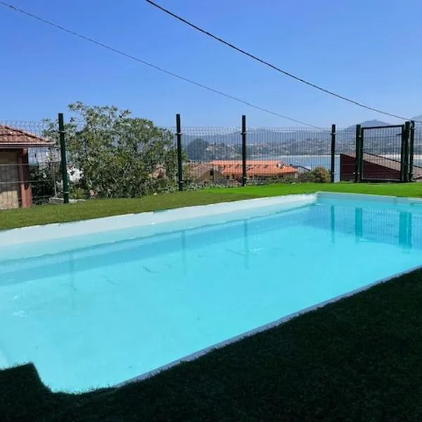 Casita Independiente y tres apartamentos con piscina Ladeira Playa，位于巴约讷的酒店