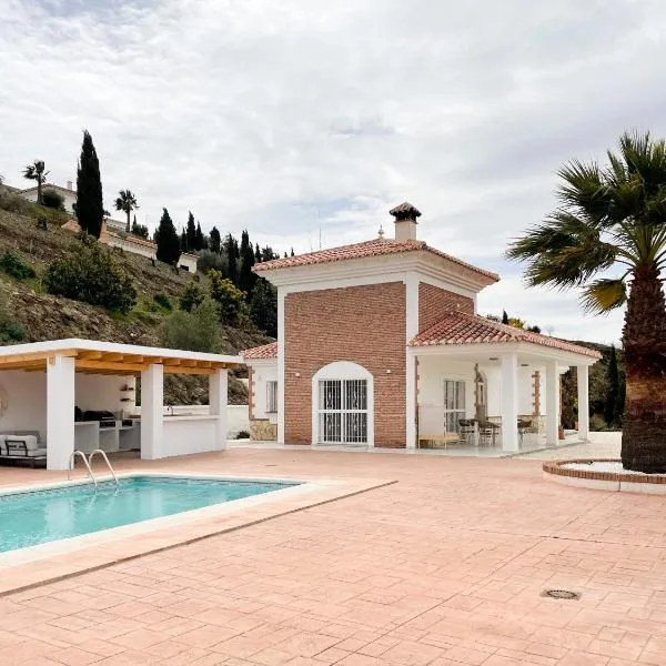 Luxury villa - breathtaking views - hot tub - 15' to beach，位于孔佩塔的酒店