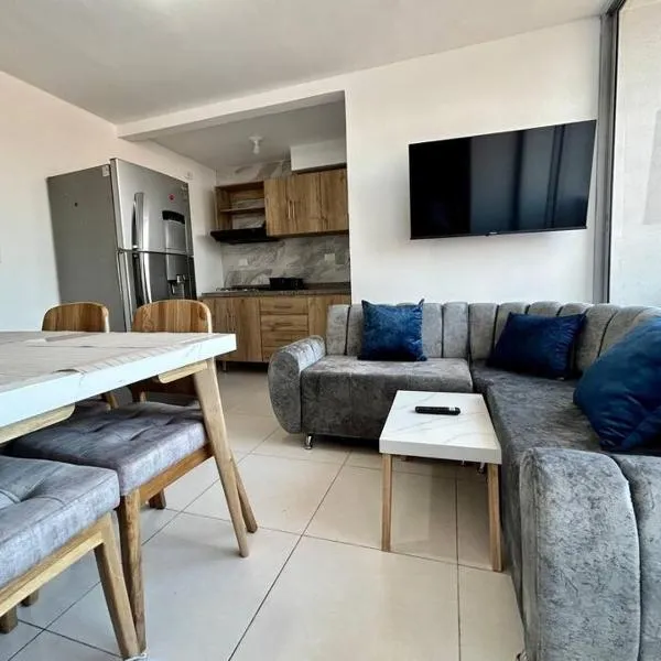 Acogedor apartamento tres habitaciones，位于库库塔的酒店