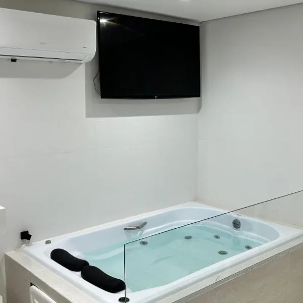 Pousada Lírios do Campo Hidromassagem - Ar condicionado - Piscina，位于帕拉蒂的酒店