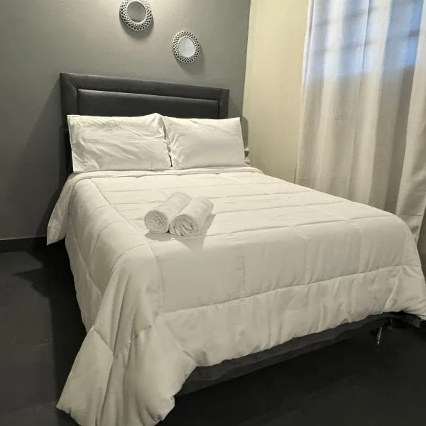 Habitación con baño privado en el centro de Asunción，位于亚松森的酒店