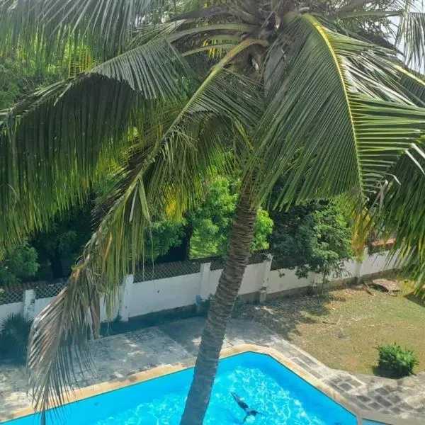 Ary Homestay - On Corral Drive，位于尼亚利的酒店