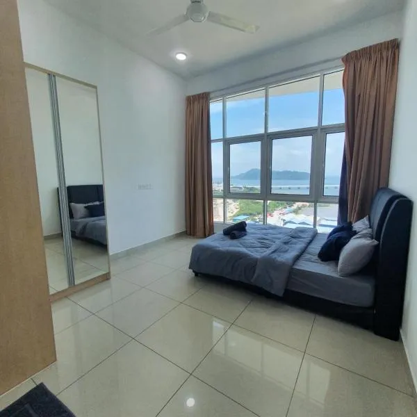 Southbay Seaview Condo A2 10minQueensbay 10minSpice，位于峇六拜的酒店